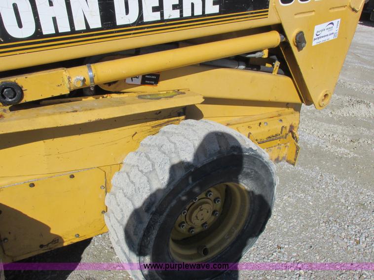 image for item L7098 1997 John Deere 8875 skid steer