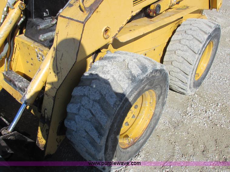 image for item L7098 1997 John Deere 8875 skid steer