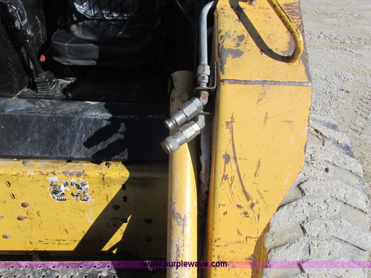 image for item L7098 1997 John Deere 8875 skid steer