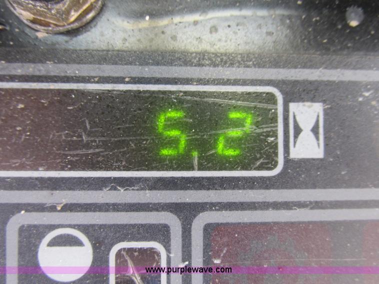 image for item L7098 1997 John Deere 8875 skid steer