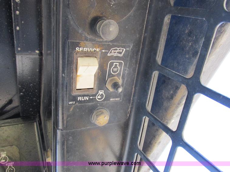 image for item L7098 1997 John Deere 8875 skid steer