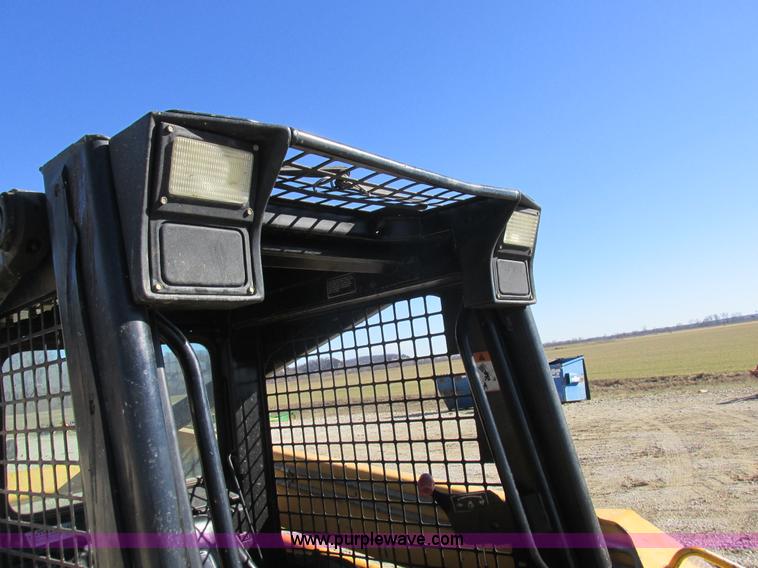 image for item L7098 1997 John Deere 8875 skid steer