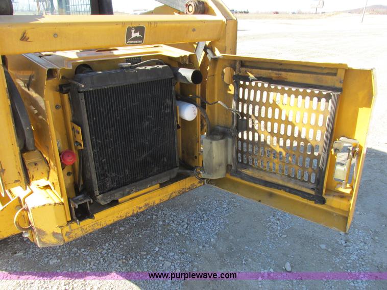 image for item L7098 1997 John Deere 8875 skid steer