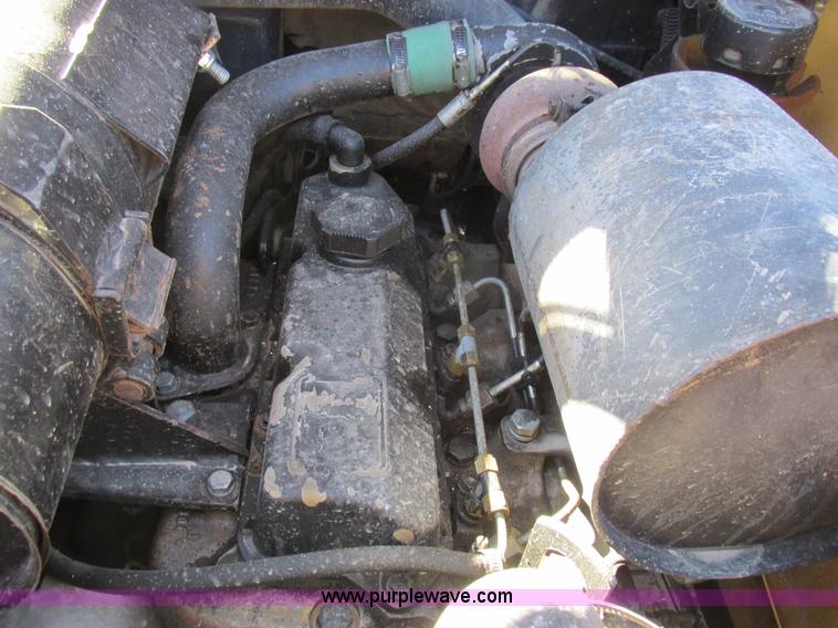 image for item L7098 1997 John Deere 8875 skid steer