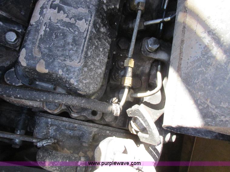 image for item L7098 1997 John Deere 8875 skid steer