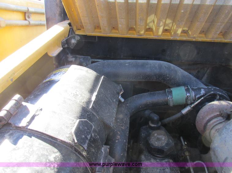 image for item L7098 1997 John Deere 8875 skid steer