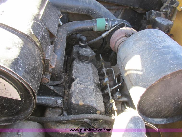 image for item L7098 1997 John Deere 8875 skid steer