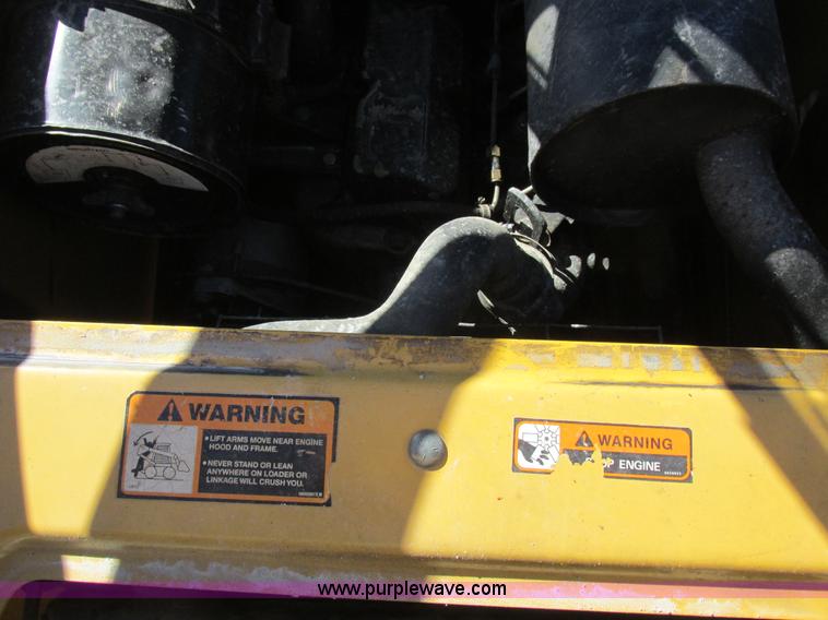 image for item L7098 1997 John Deere 8875 skid steer