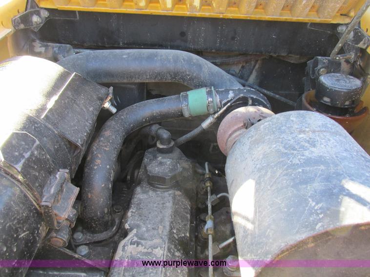 image for item L7098 1997 John Deere 8875 skid steer