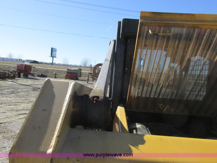 image for item L7098 1997 John Deere 8875 skid steer