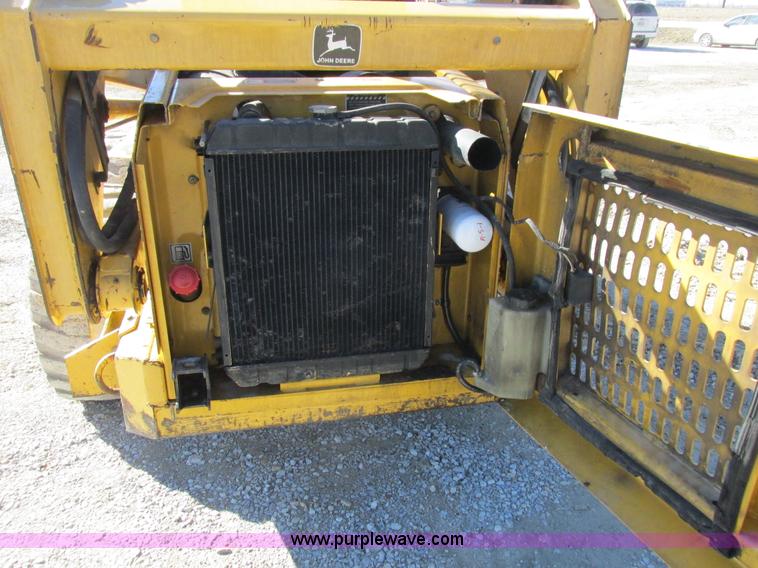 image for item L7098 1997 John Deere 8875 skid steer