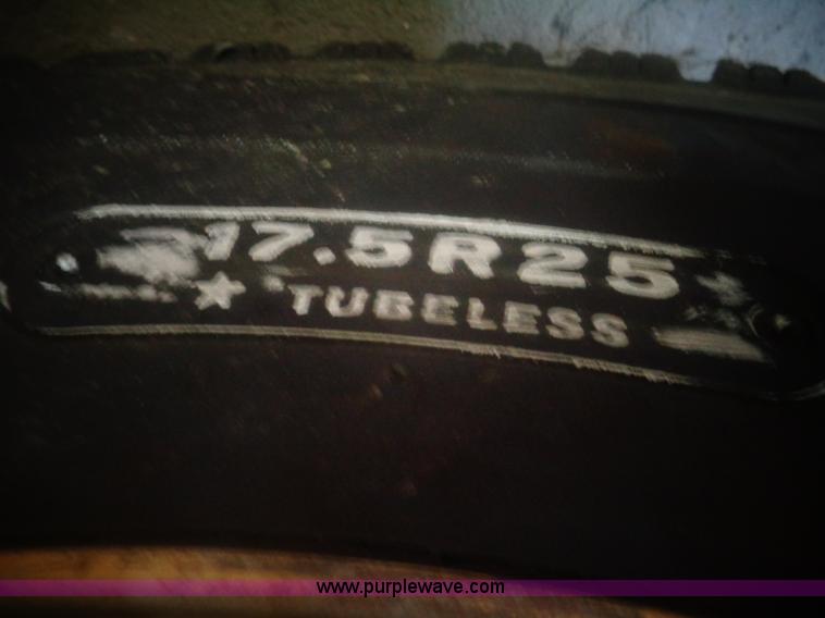 image for item AL9228 (2) Caterpillar 140 motor grader tires and wheels