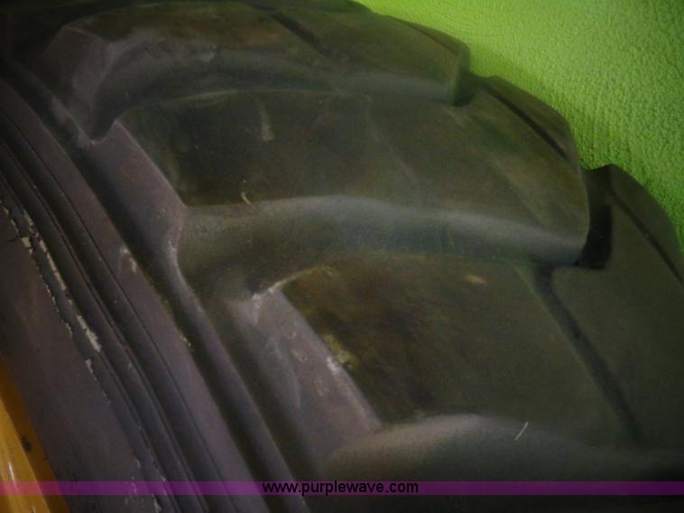 image for item AL9228 (2) Caterpillar 140 motor grader tires and wheels