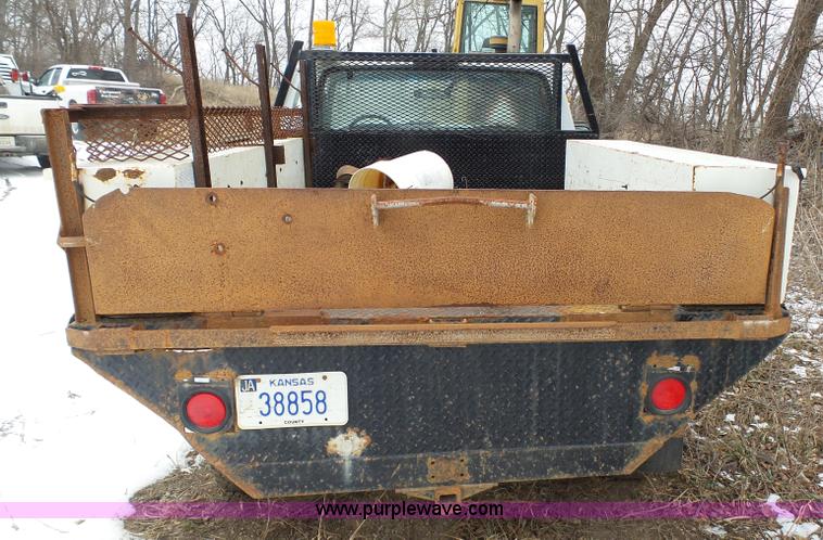 image for item J7373 1994 Ford F250 XL HD flatbed pickup truck