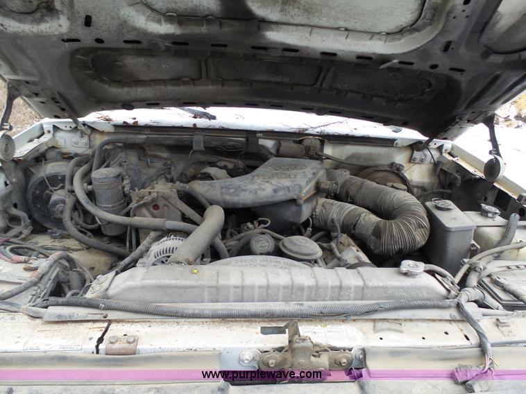 image for item J7373 1994 Ford F250 XL HD flatbed pickup truck