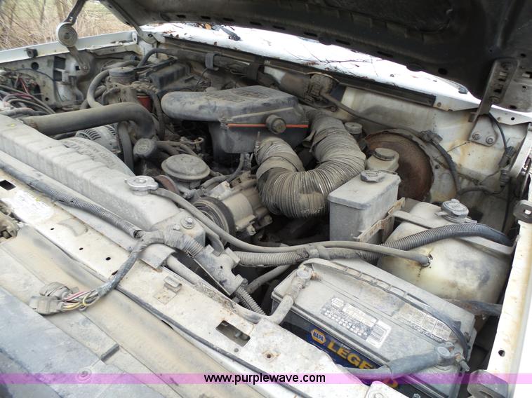 image for item J7373 1994 Ford F250 XL HD flatbed pickup truck