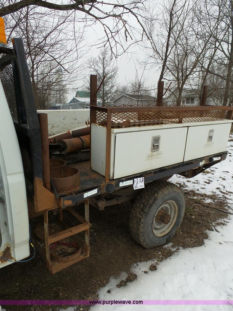 image for item J7373 1994 Ford F250 XL HD flatbed pickup truck