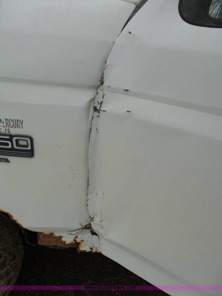 image for item J7373 1994 Ford F250 XL HD flatbed pickup truck