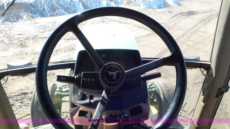 image for item K6966 1995 John Deere 7700 tractor