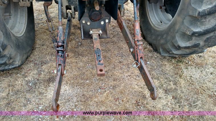 image for item L6118 Case 585 tractor