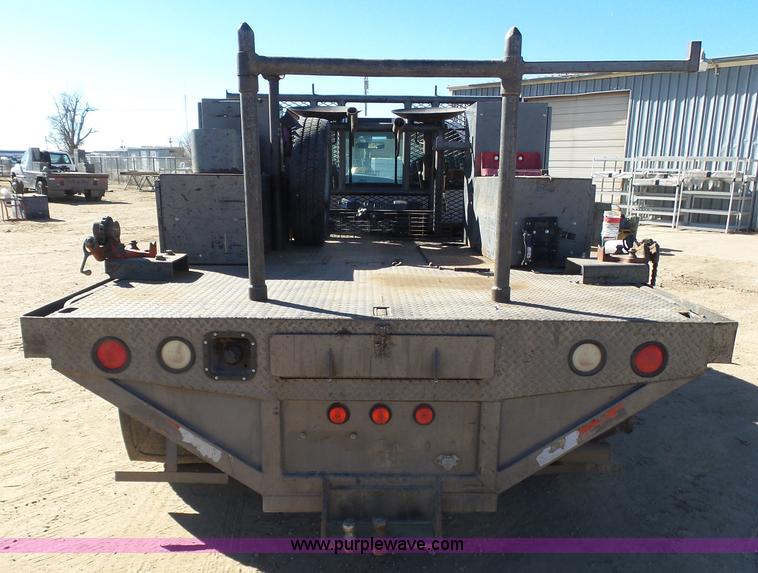 image for item J6759 2007 Ford F450 Super Duty flatbed truck