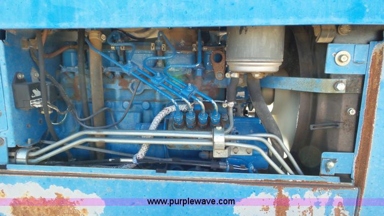 image for item K6977 1996 New Holland 1920 MFWD tractor