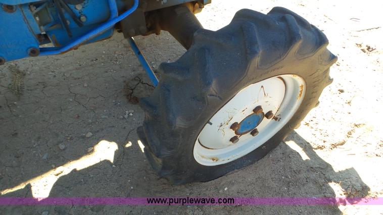 image for item K6991 Ford 1920 MFWD tractor