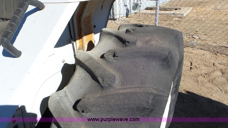 image for item K6991 Ford 1920 MFWD tractor