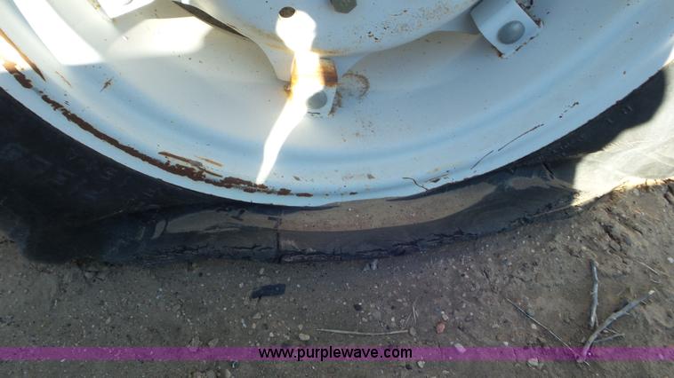 image for item K6991 Ford 1920 MFWD tractor