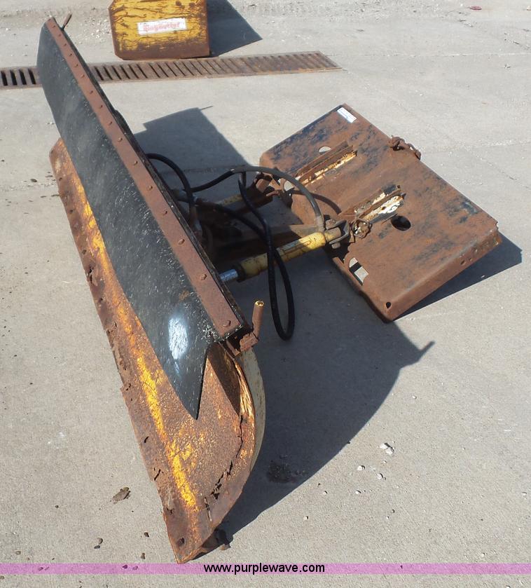 Skid steer snow plow in Kansas City, MO Item BF9141 sold Purple Wave