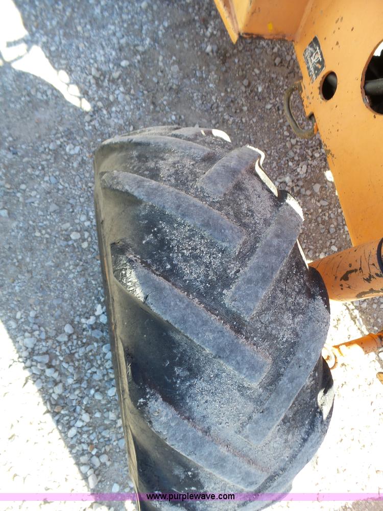 image for item BL9709 Allmand TLB325 backhoe