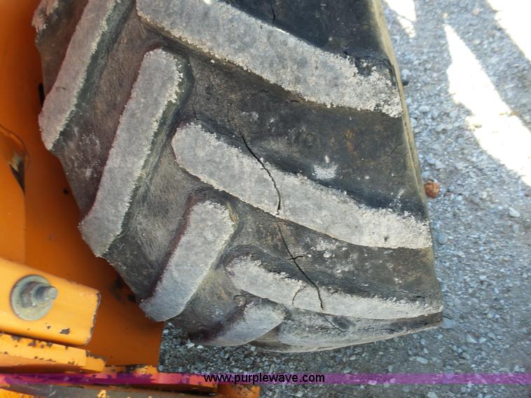 image for item BL9709 Allmand TLB325 backhoe