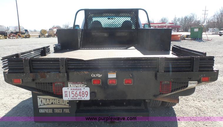 image for item J4710 2007 Ford F350 Super Duty flatbed pickup truck