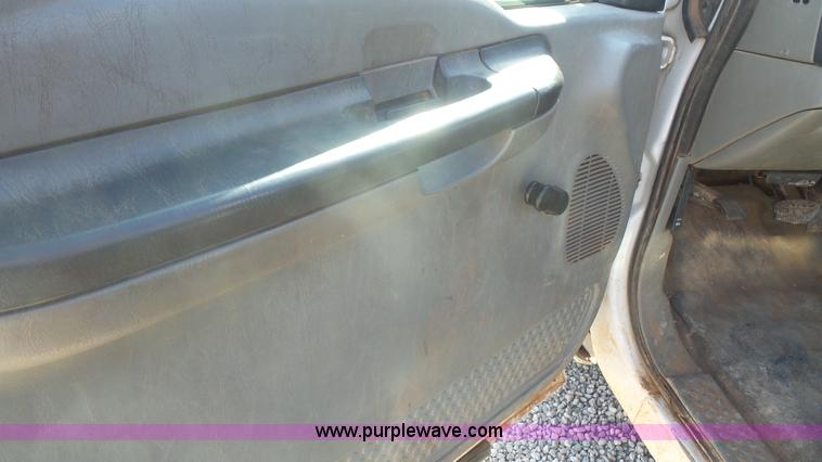 image for item J4710 2007 Ford F350 Super Duty flatbed pickup truck