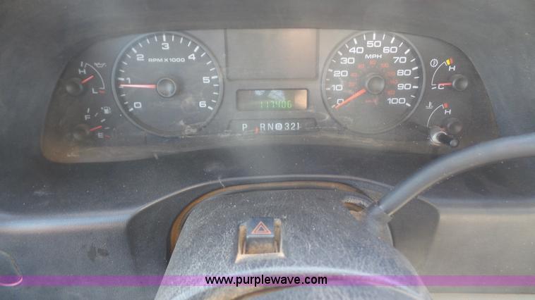 image for item J4710 2007 Ford F350 Super Duty flatbed pickup truck