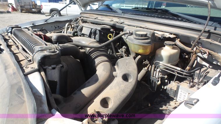 image for item J4710 2007 Ford F350 Super Duty flatbed pickup truck