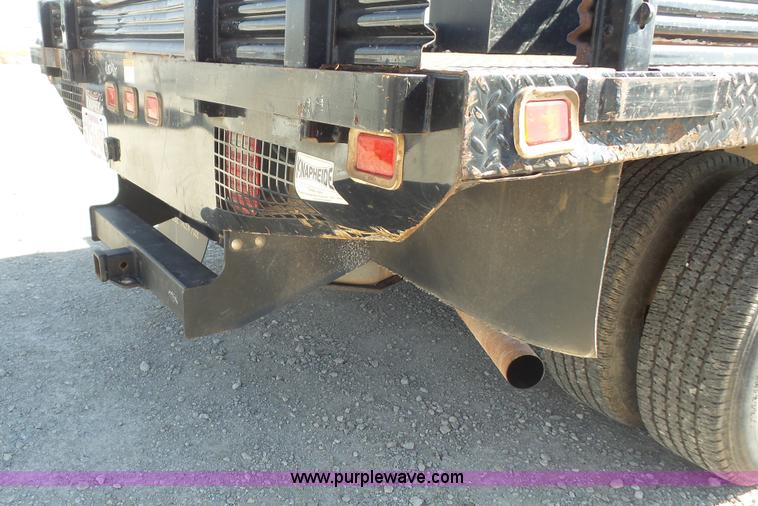 image for item J4710 2007 Ford F350 Super Duty flatbed pickup truck