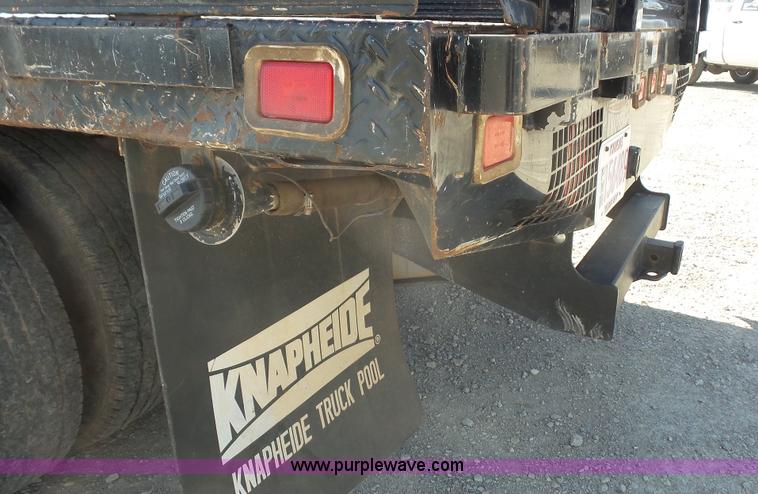 image for item J4710 2007 Ford F350 Super Duty flatbed pickup truck