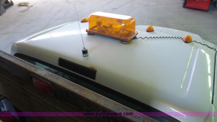 image for item J4735 2000 Ford F450 Super Duty flatbed truck