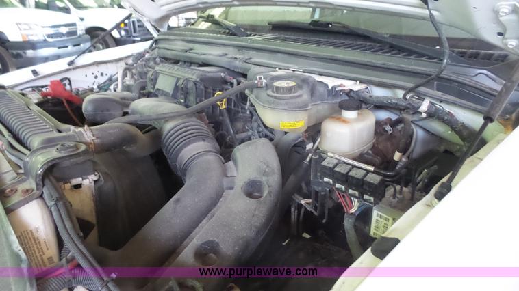 image for item J4737 2006 Ford F350 Super Duty flatbed pickup truck