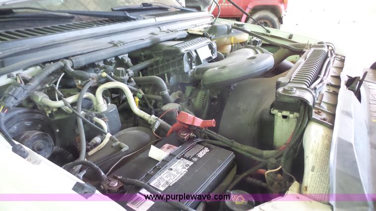 image for item J4737 2006 Ford F350 Super Duty flatbed pickup truck