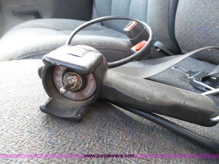 image for item J7303 2004 Chevrolet Silverado 2500HD flatbed pickup truck