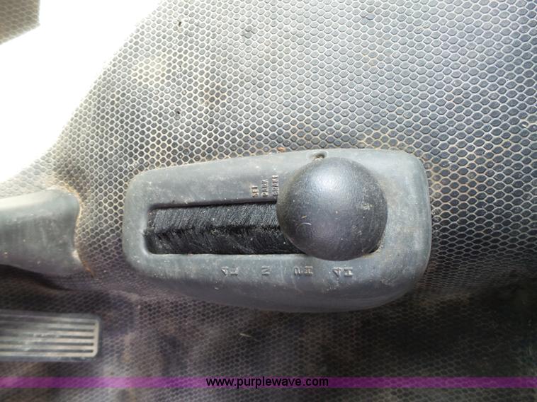 image for item J7303 2004 Chevrolet Silverado 2500HD flatbed pickup truck