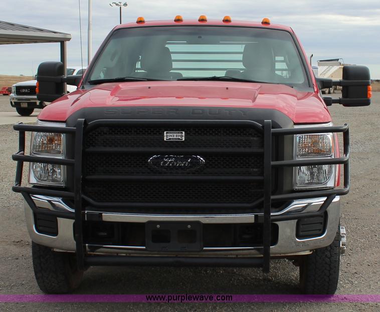 image for item J7577 2012 Ford F350 Super Duty XLT SuperCab flatbed pickup truck