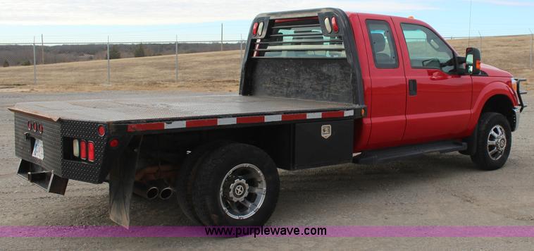 image for item J7577 2012 Ford F350 Super Duty XLT SuperCab flatbed pickup truck