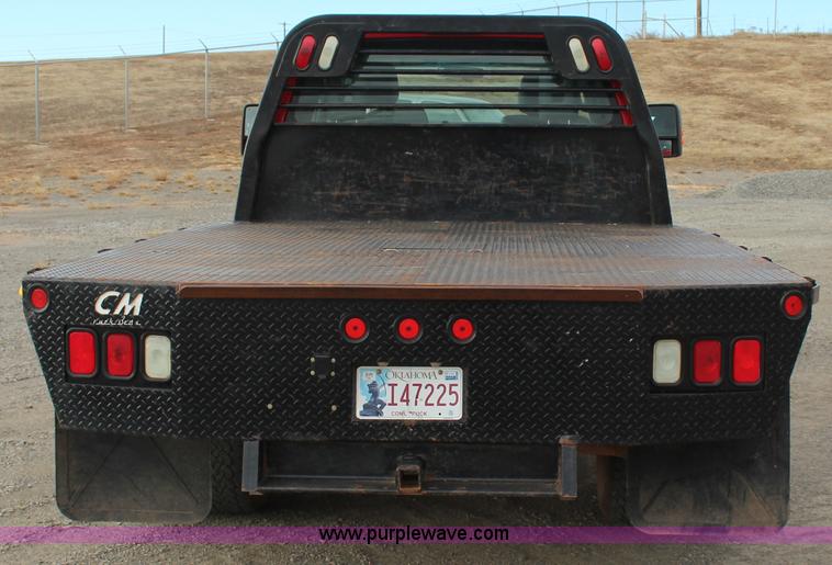 image for item J7577 2012 Ford F350 Super Duty XLT SuperCab flatbed pickup truck