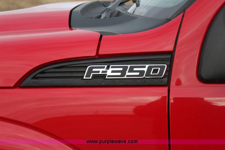 image for item J7577 2012 Ford F350 Super Duty XLT SuperCab flatbed pickup truck