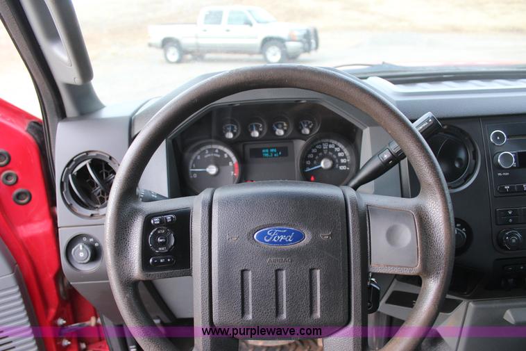 image for item J7577 2012 Ford F350 Super Duty XLT SuperCab flatbed pickup truck