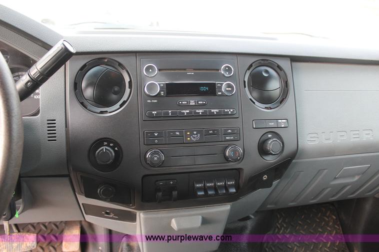 image for item J7577 2012 Ford F350 Super Duty XLT SuperCab flatbed pickup truck