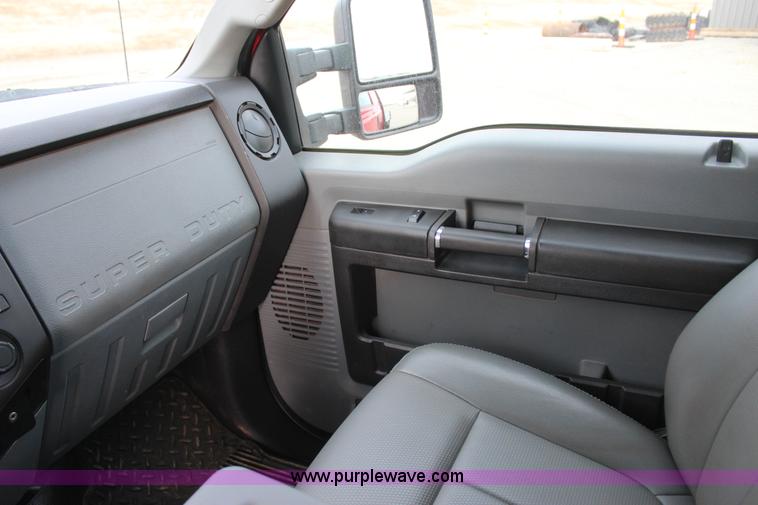 image for item J7577 2012 Ford F350 Super Duty XLT SuperCab flatbed pickup truck